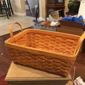 Woven basket with handles